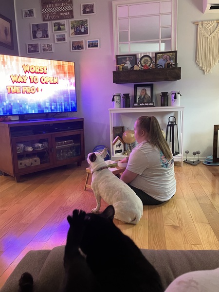 Belle and her dog Cassie watching Americans Funniest videos