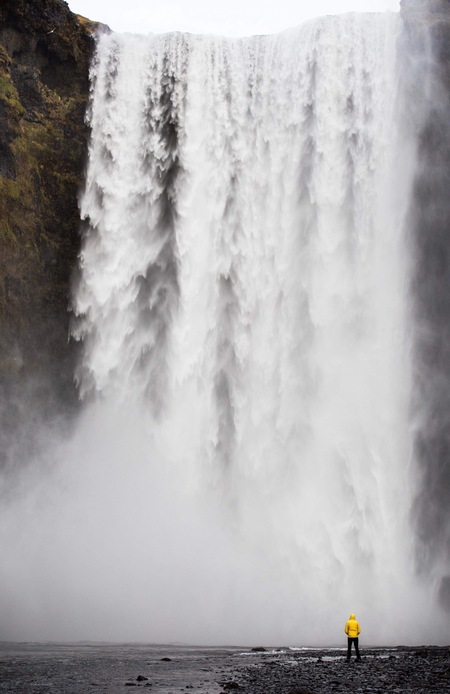 A man in a yellow jacket in Iceland